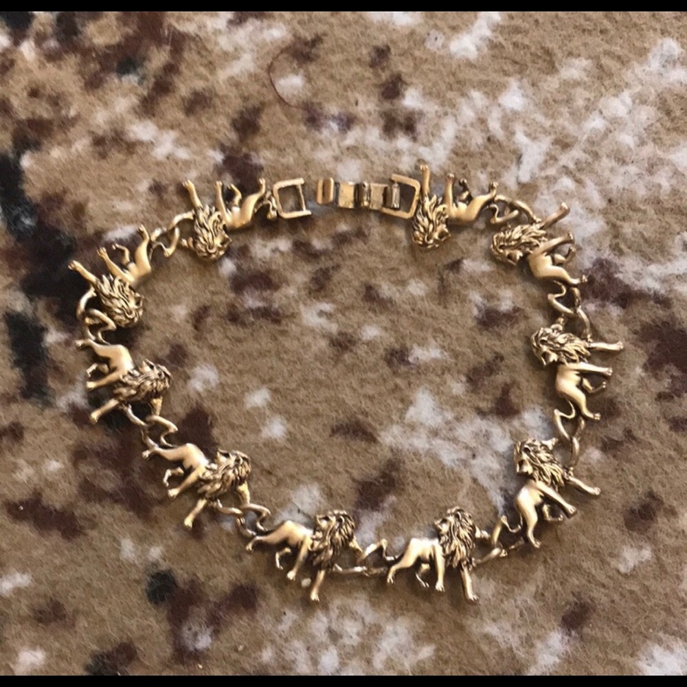 Lion Gold Tone Link Charm Bracelet.